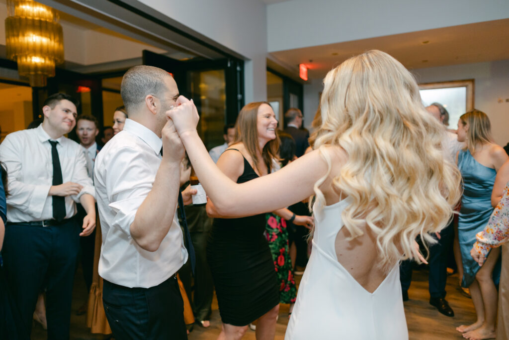 A groom and bride dance at the Riggs Hotel DC.