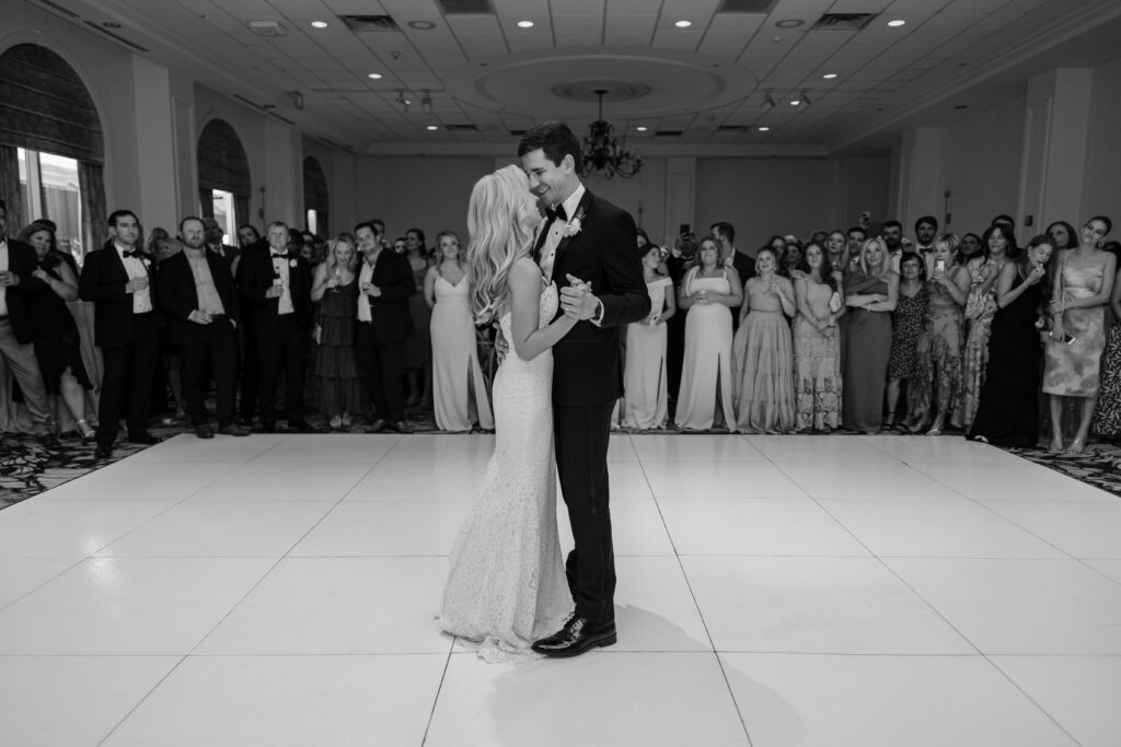 A bride and groom share a first dance. 