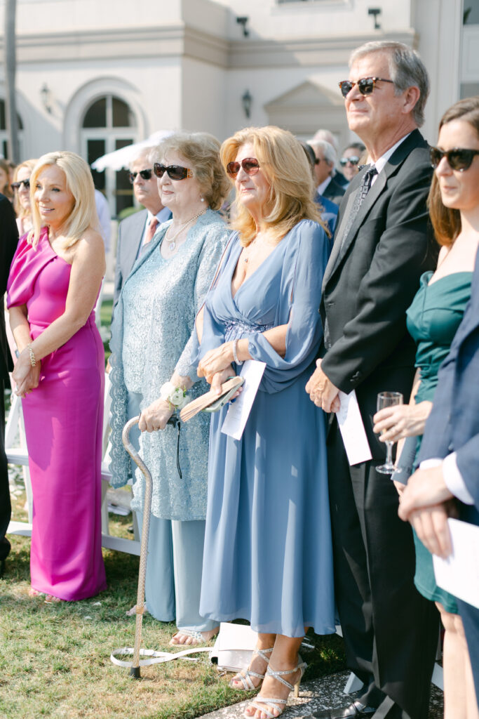 Wedding guests at a ceremony. 