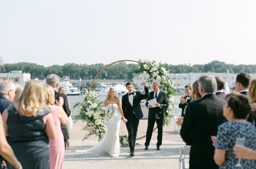 A bride and groom celebrate being married at Westin Savannah