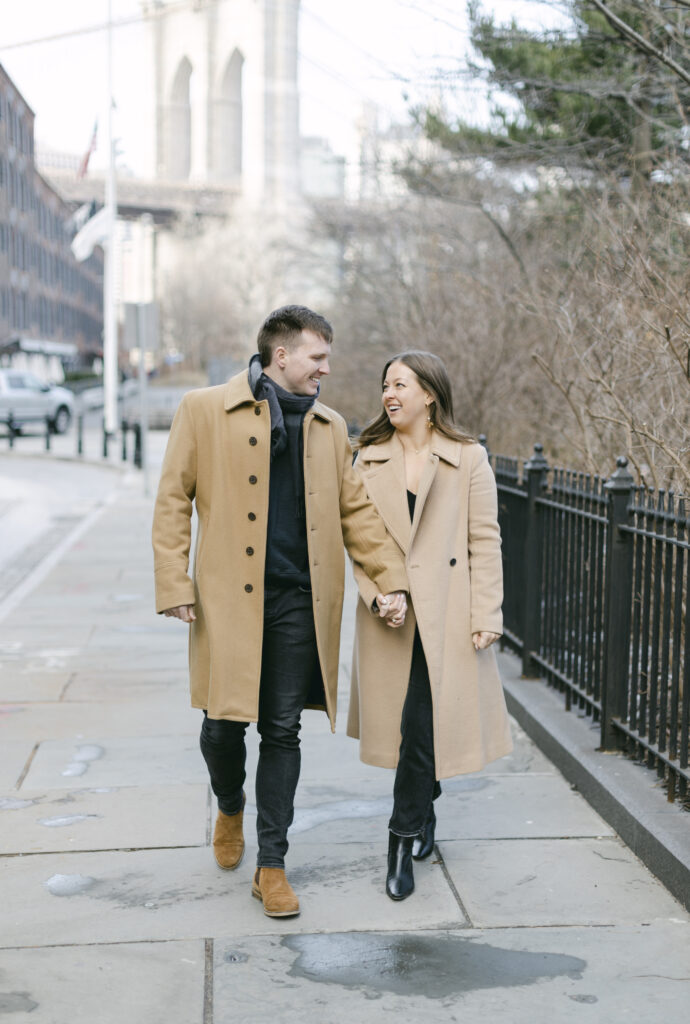 A couple walks on Washington Street NYC